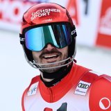 Loïc Meillard et ses rivaux disputeront mercredi à Schladming la dernière épreuve technique avant les JO KEYSTONE/AP/Marco Trovati