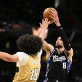 Kyshawn George (de dos) et les Wizards ont battu les Kings dimanche KEYSTONE/AP/Nick Wass