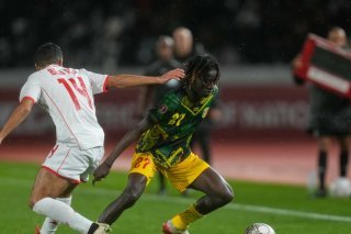 Gaoussou Diakite et le Mali sont parvenus à se qualifier pour les quarts de la CAN en battant la Tunisie aux tirs au but. KEYSTONE/AP/Themba Hadebe