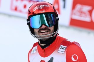 Loïc Meillard et ses rivaux disputeront mercredi à Schladming la dernière épreuve technique avant les JO KEYSTONE/AP/Marco Trovati