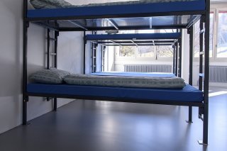 Le crédit pour les conteneurs destinés aux requérants d'asile divise les Chambres fédérales (photo d'illustration).